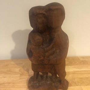 Wooden sculpture of family